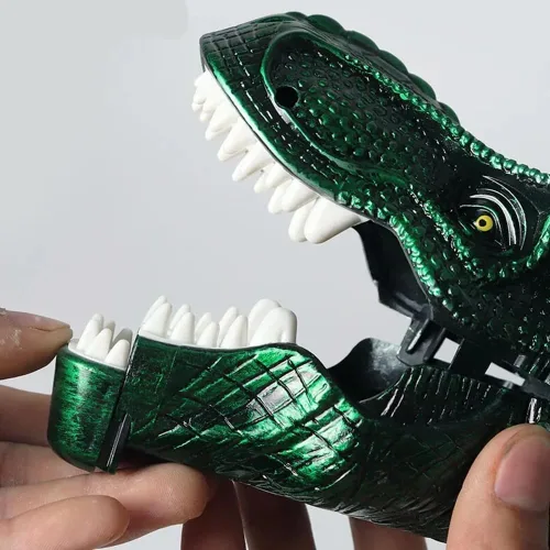 Vista 5 de Kovot Juego de disparos de autos de dinosaurios: 2 cabezas de dinosaurio y 4 autos de clic y disparos incluidos