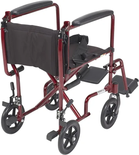 Vista 3 de Drive Medical Silla de ruedas de transporte plegable ligera con reposapiés abatibles, rojo