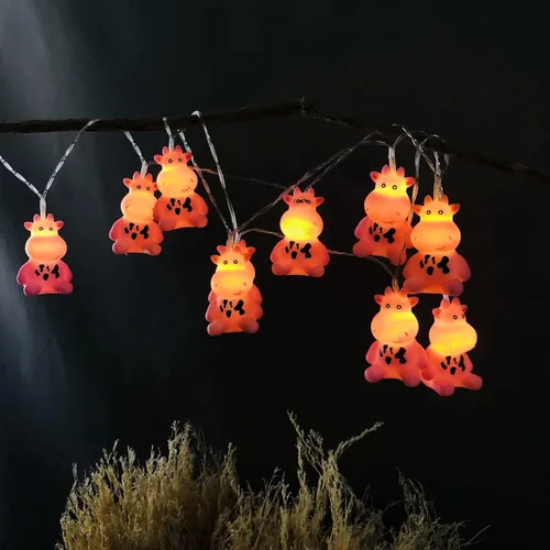 Vista 10 de Guirnalda de luces de vaca de Pascua de 5.4 pies, 10 luces LED de hadas de vaca de Navidad, funciona con pilas para decoración del hogar, fiesta